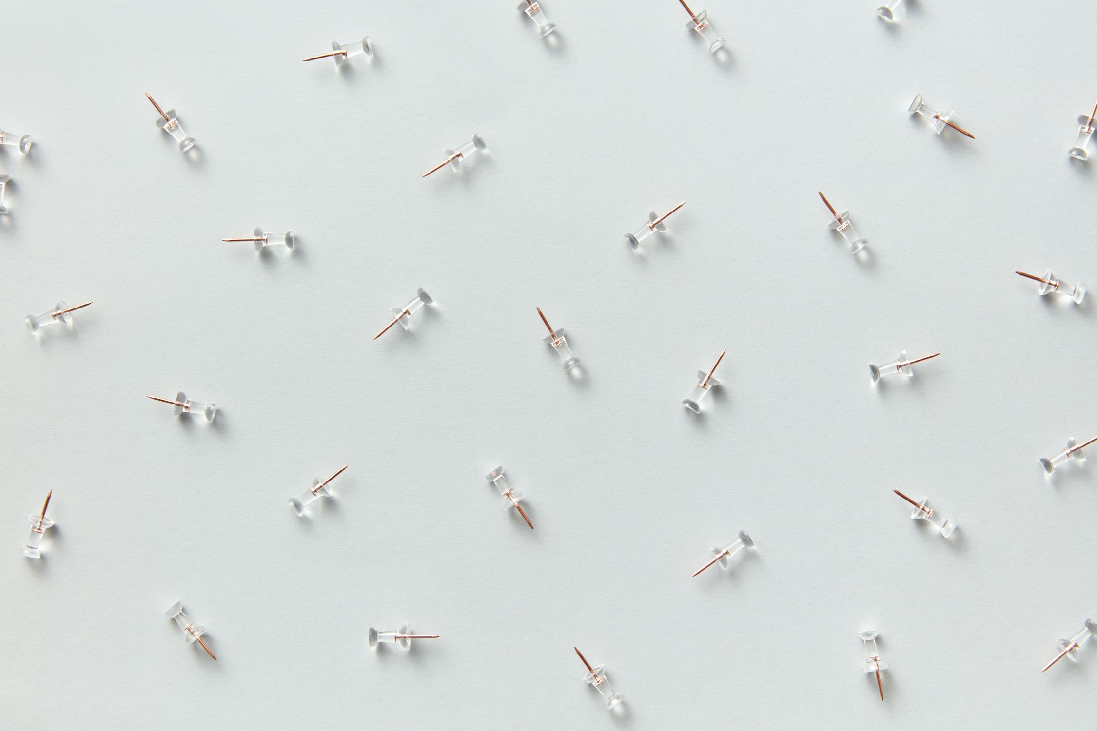 Small Pinpoint Small Pins on White Background · Free Stock Photo