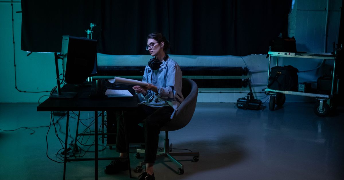 Creative at work in a moody studio