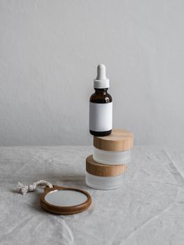 Minimalist skincare product display featuring wooden elements and neutral tones.