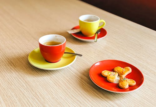 Free Cups of Coffee on Saucers Stock Photo