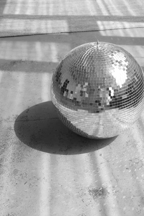 Disco Ball on Concrete Floor 