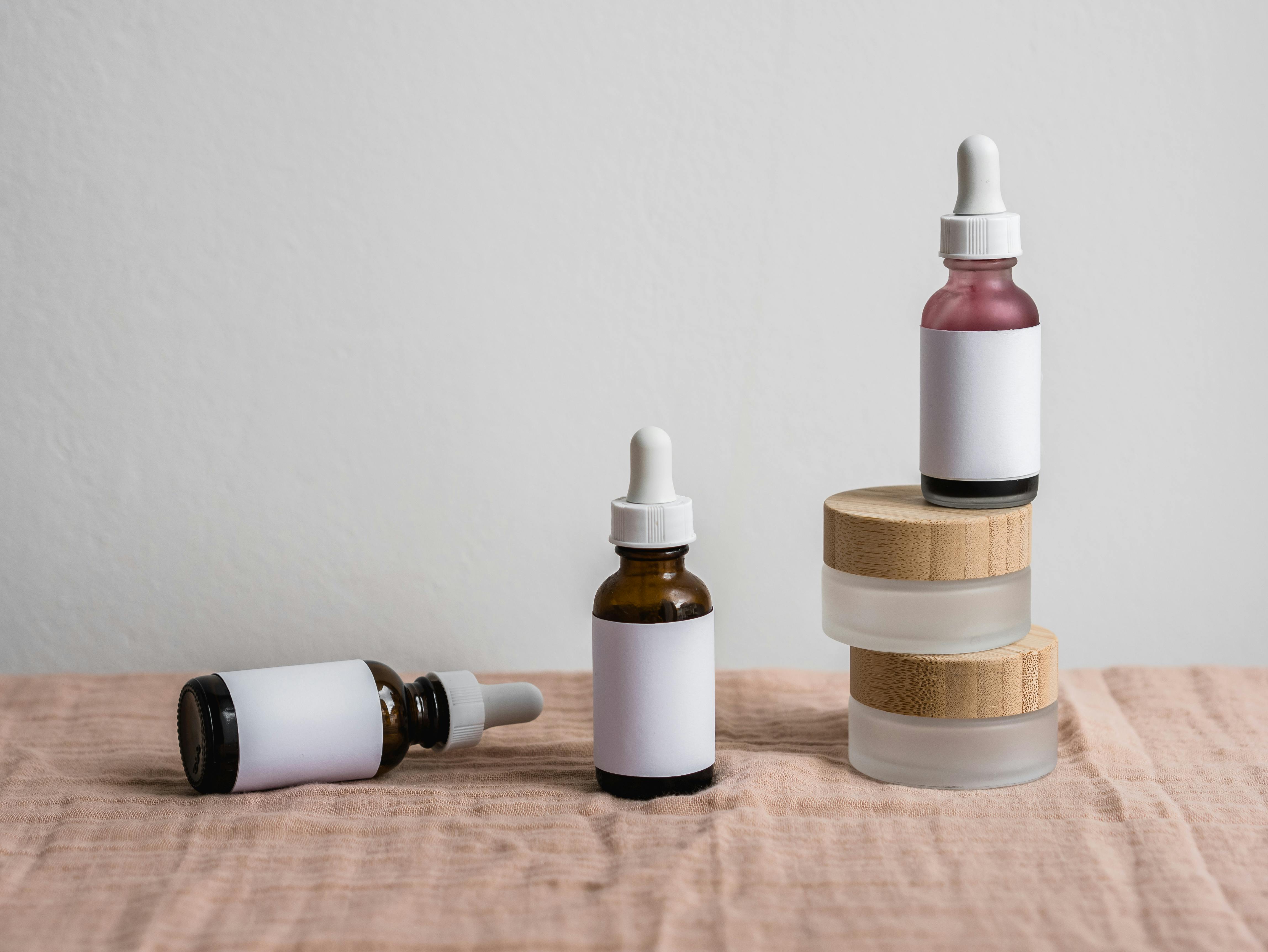 Various skincare serums in dropper bottles - Skincare resolutions 2025