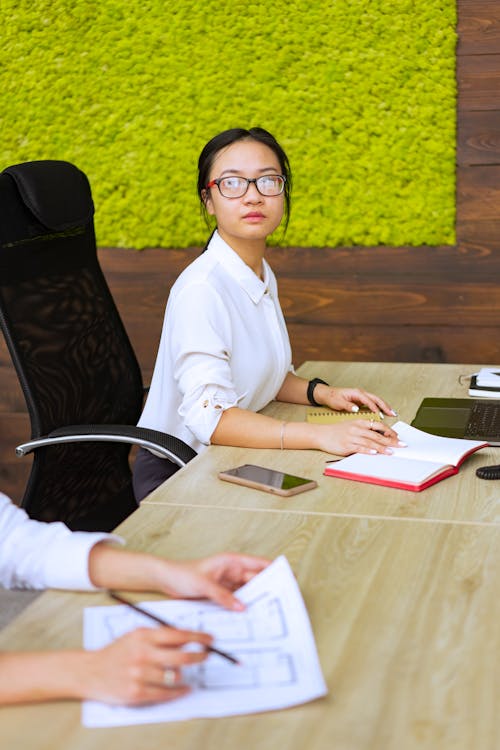 A Woman Sitting on a Chair