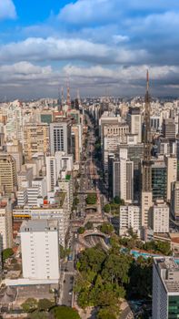 Aerial shot of São Paulo's skyline showcasing skyscrapers and vibrant urban life.