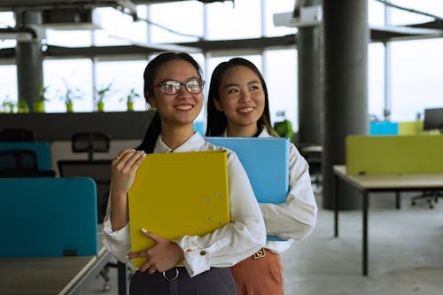 Free Happy Women in a Workplace Stock Photo