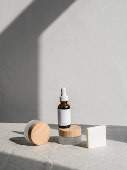 Sleek arrangement of skincare products in natural light for elegant branding.