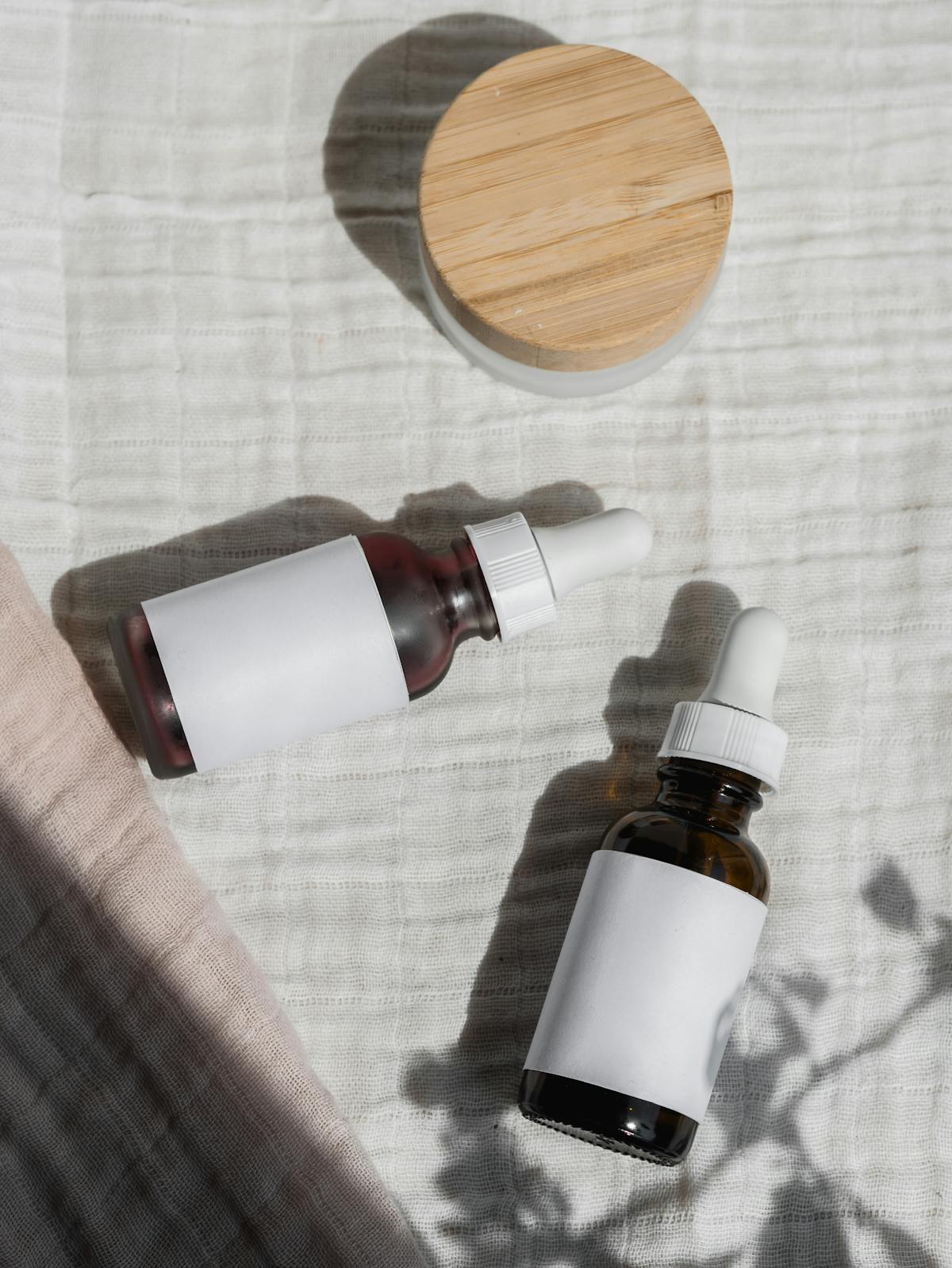 Music producer wearing headphones and working with audio plugins on a computer