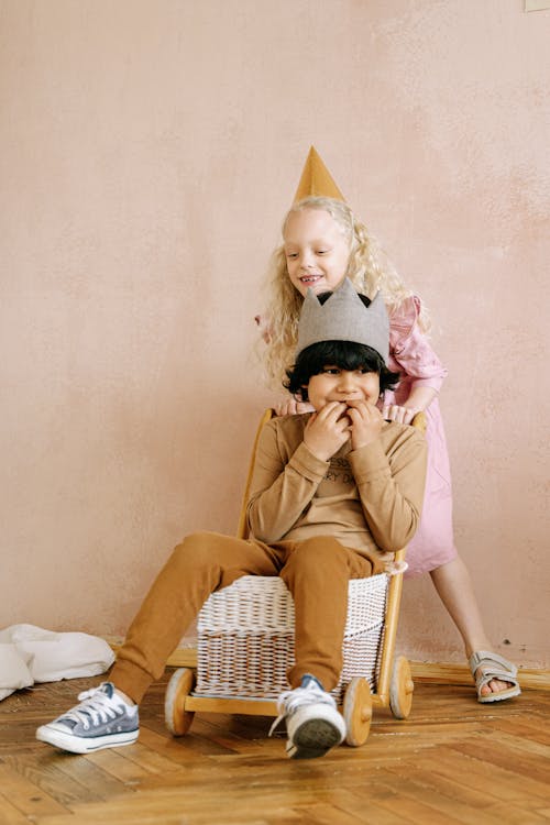 Playful Children wearing Party Hats 