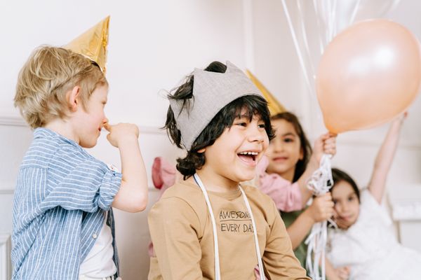 Kids with balloons at party