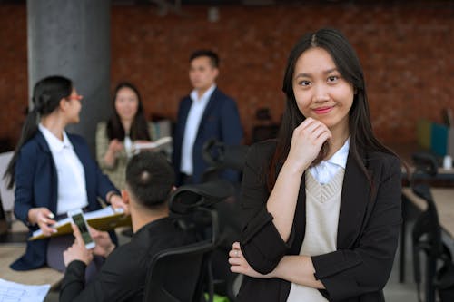 Woman in Black Blazer Smiling