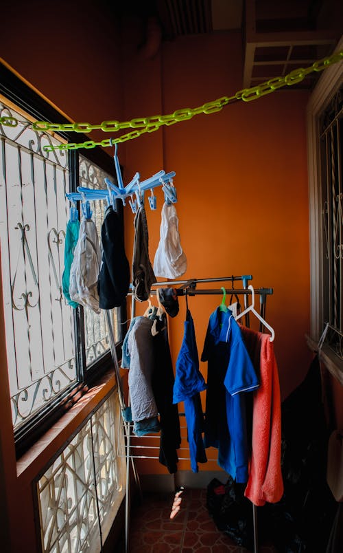 Gratis stockfoto met hanger, kleding, opknopen