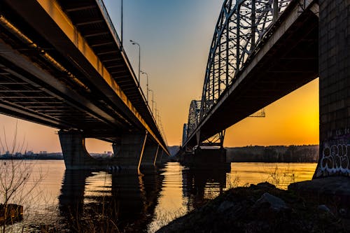 Kostnadsfri bild av arkitektur, broar, gyllene timmen