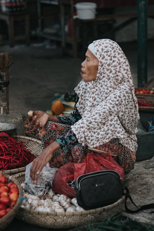 Elderly Woman Selling Vegetables