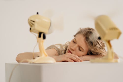 A Woman Sleeping on the Table