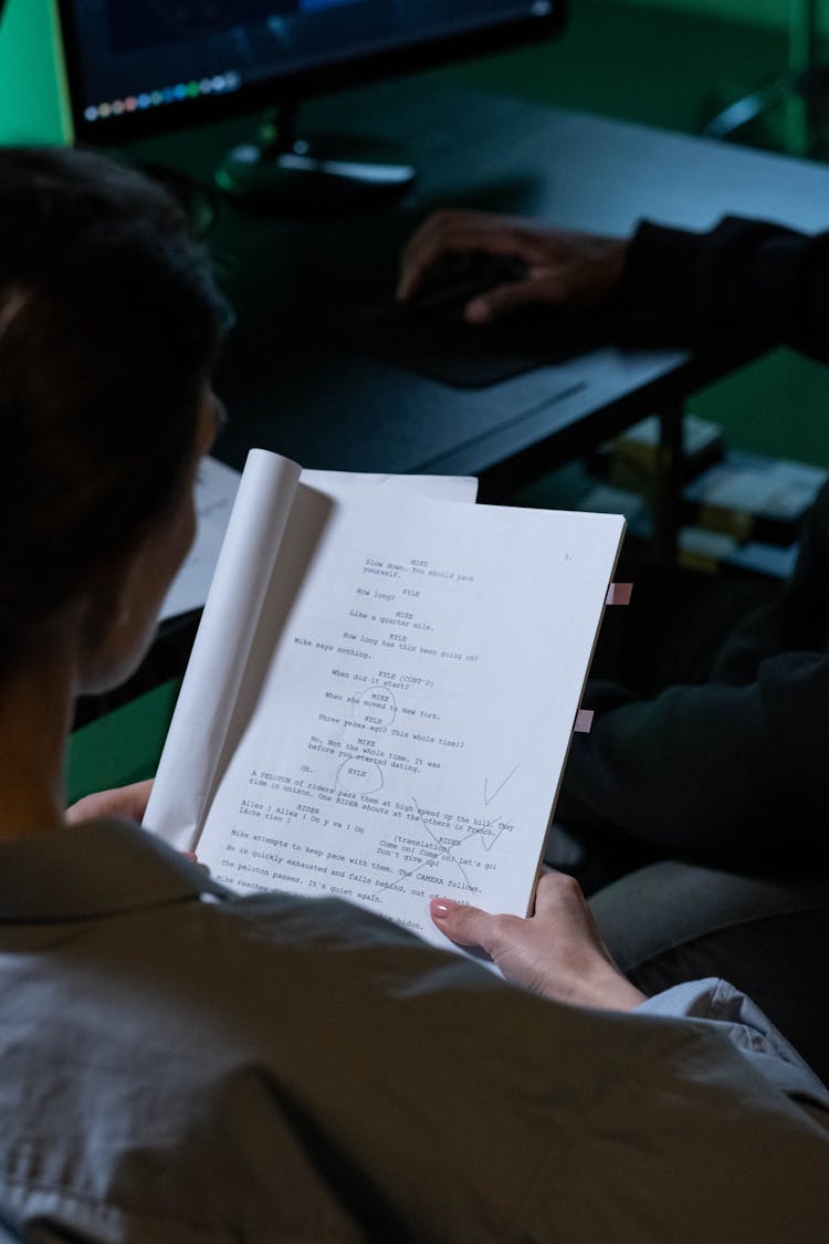 
A Woman Reading A Script