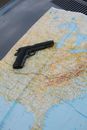 Black Semi Automatic Pistol on White and Blue Textile