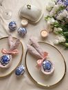 White and Pink Floral Ribbon on Brown Wooden Round Tray