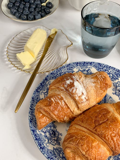 Free A Croissant With Butter  Stock Photo