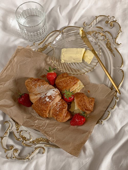 A Croissant with Strawberry on the Plate