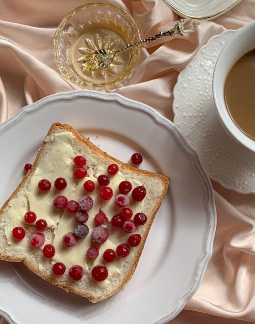 Free Sliced Bread with Butter and Berries on White Ceramic Plate Stock Photo