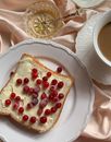 Sliced Bread with Butter and Berries on White Ceramic Plate
