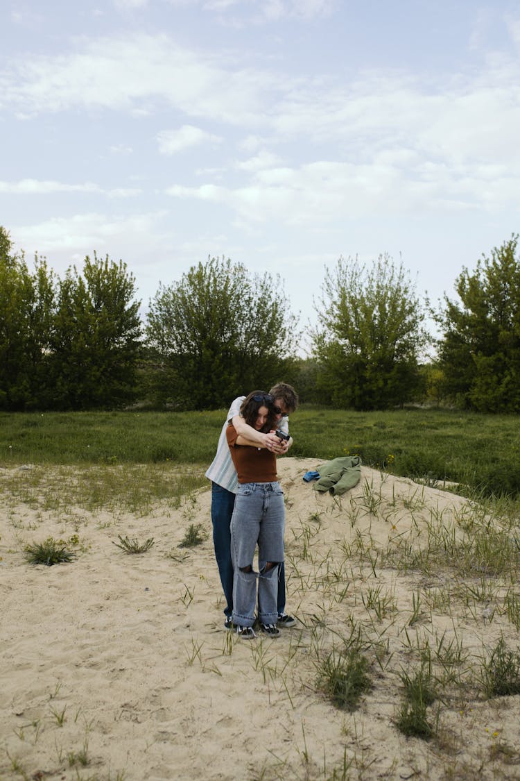 A Couple In A Shooting Range