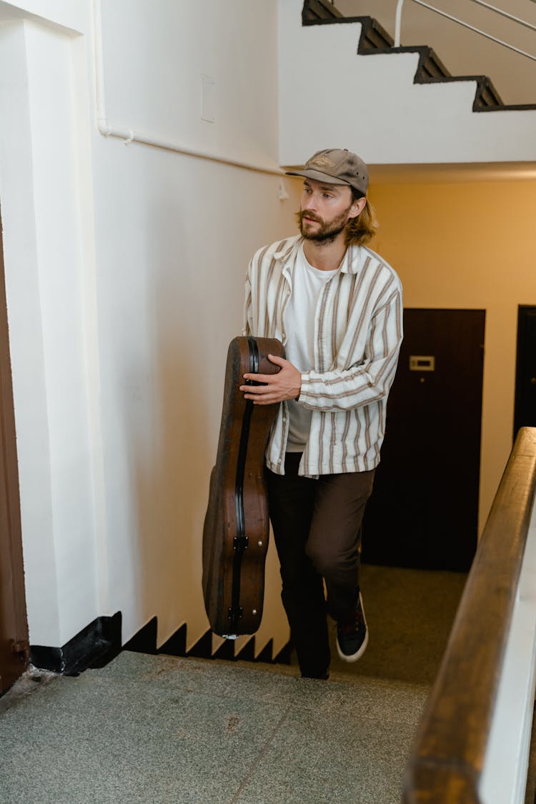 Man Going Up The Stairs