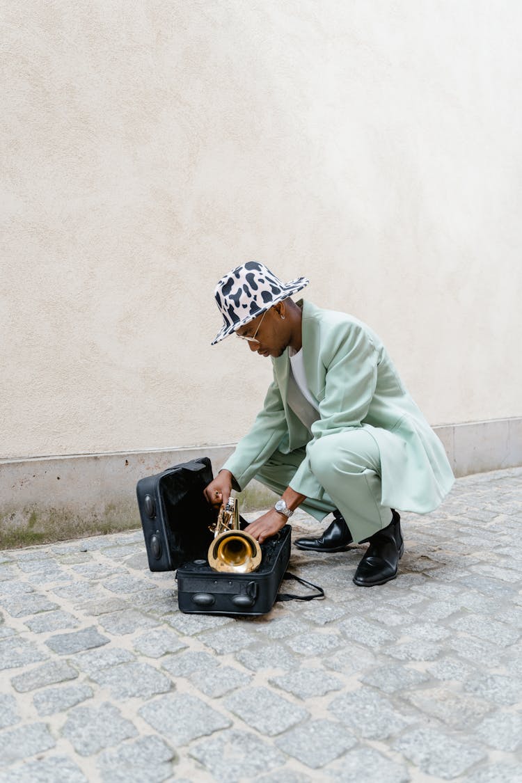 Man Packing His Trumpet