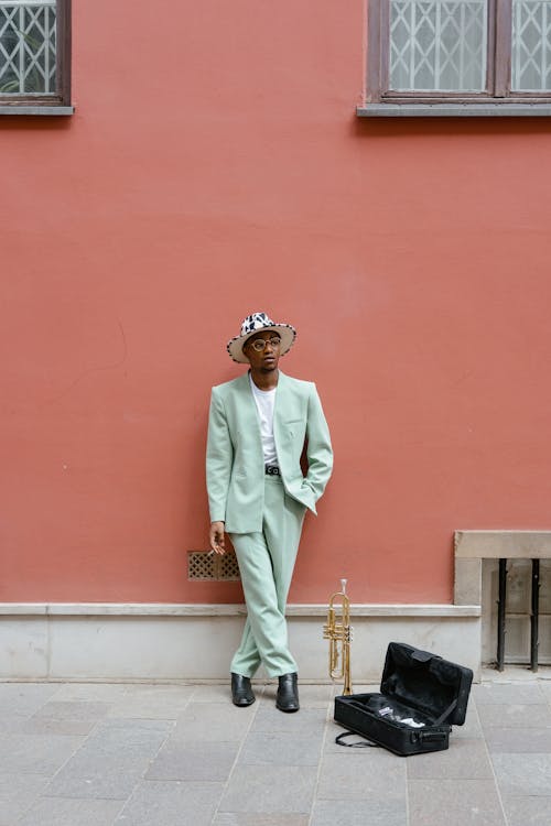 Man Leaning on the Wall Smoking