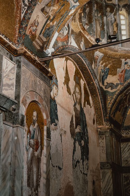Free Explore intricate Byzantine frescoes in a historic church with rich religious art. Stock Photo