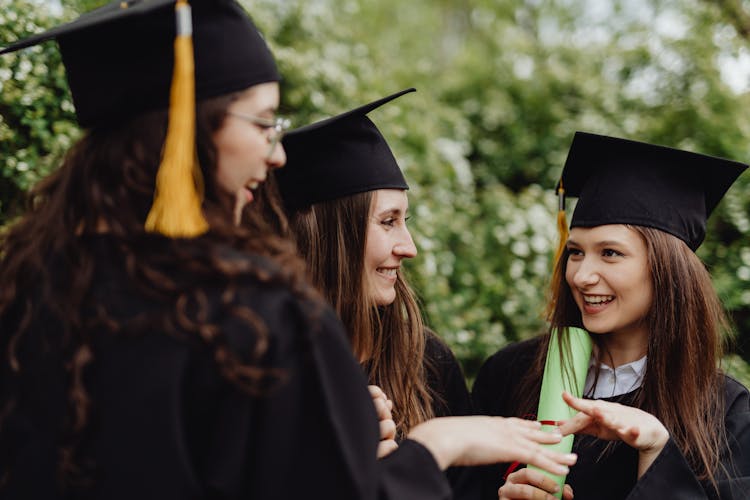 Young Graduates In Their Togas