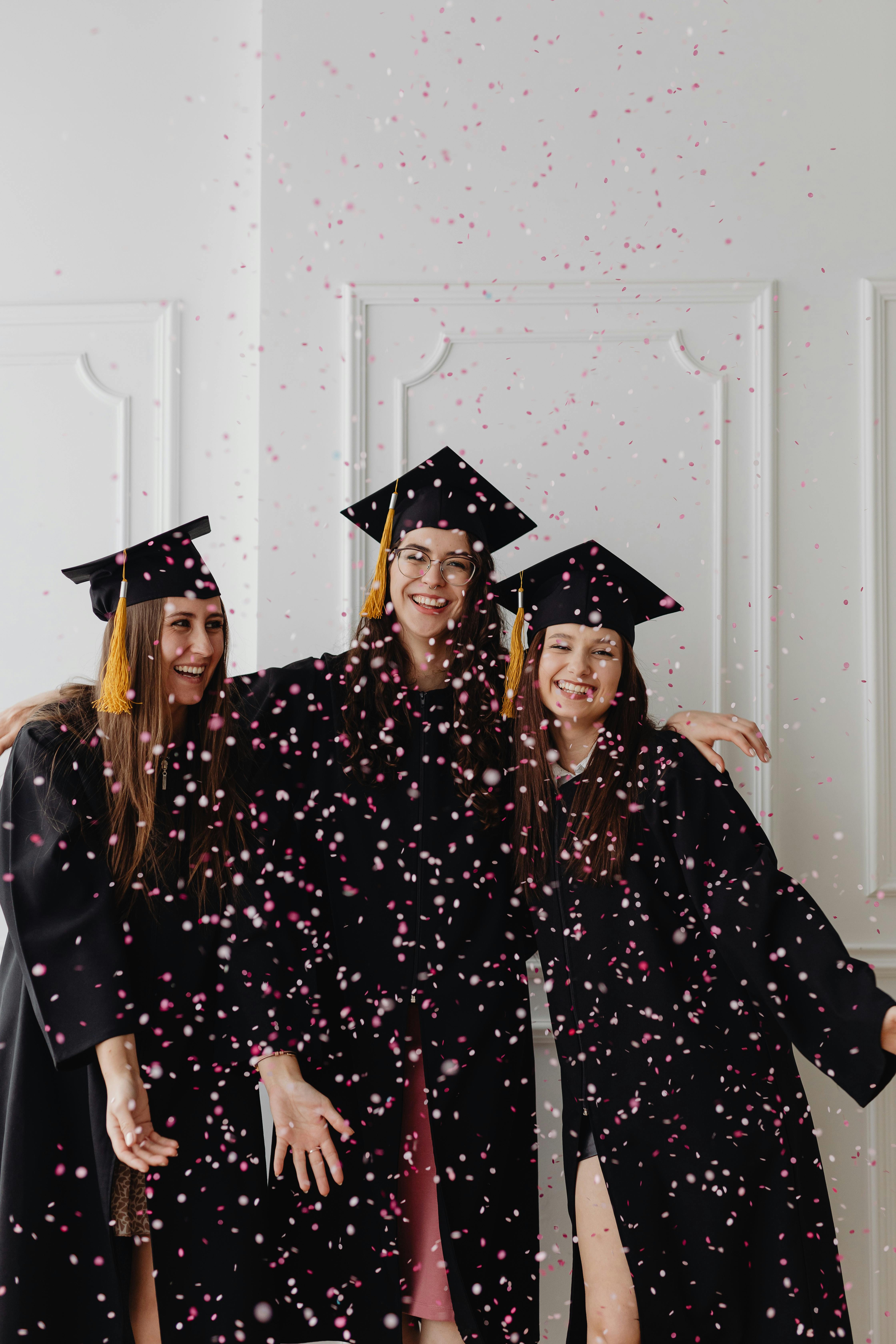 Grad: Friends Pose For Graduation Pictures Stock Photo | Adobe Stock