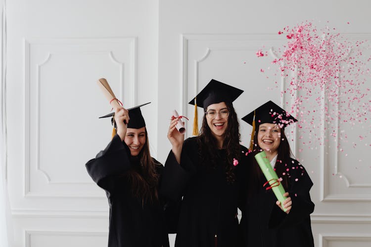 Young Girls Celebrating Their Graduation