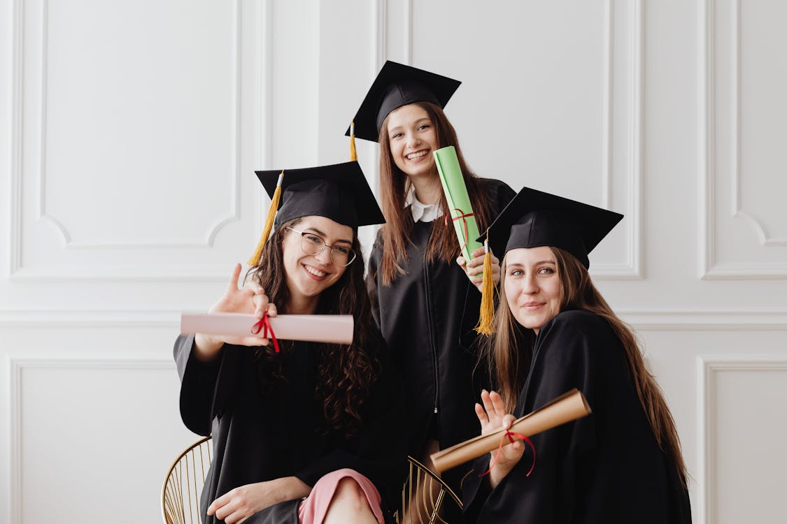 Free Young Women in Their Graduation Toga Stock Photo
