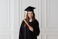 Woman in Black Academic Dress and Academic Gown