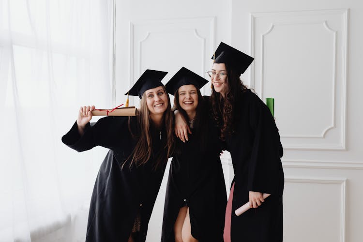 Women In Their Graduation Gowns