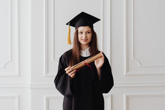 A Woman Holding a Diploma