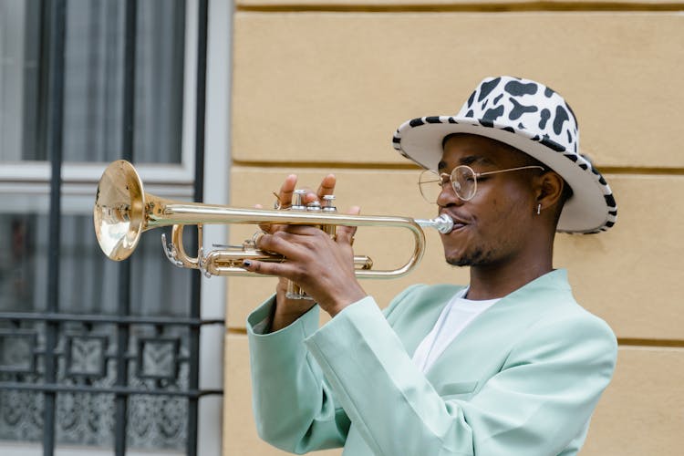 Man In Suit Playing Trumpet