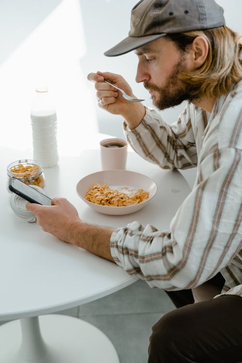 Free Man Eating Breakfast Stock Photo