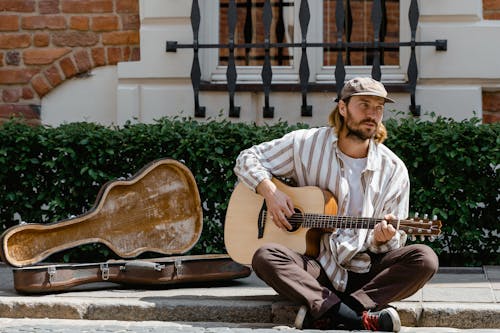 Free Man Playing Acoustic Guitar Stock Photo