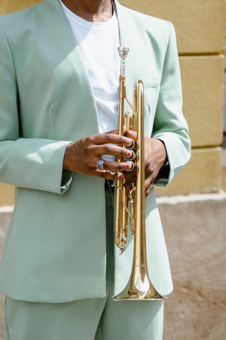 Man Holding A Trumpet