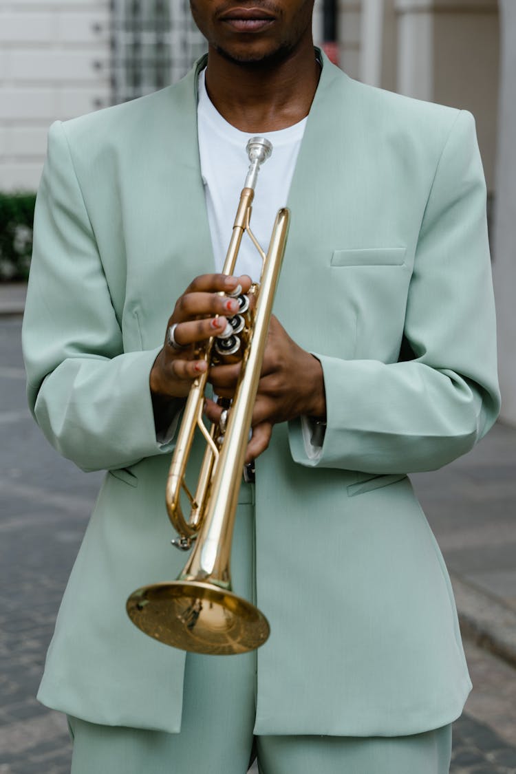 Man Holding A Trumpet