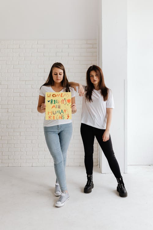 Women Posing in White Shirt