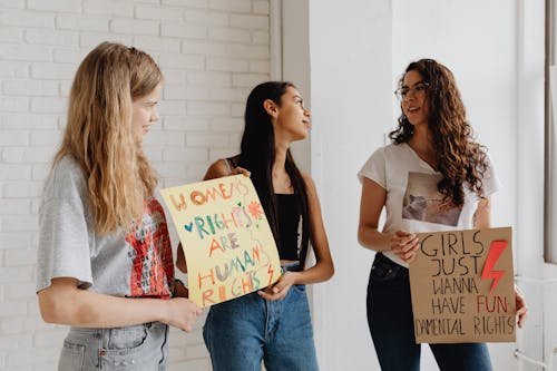 Free Photo of Women Holding Posters Stock Photo