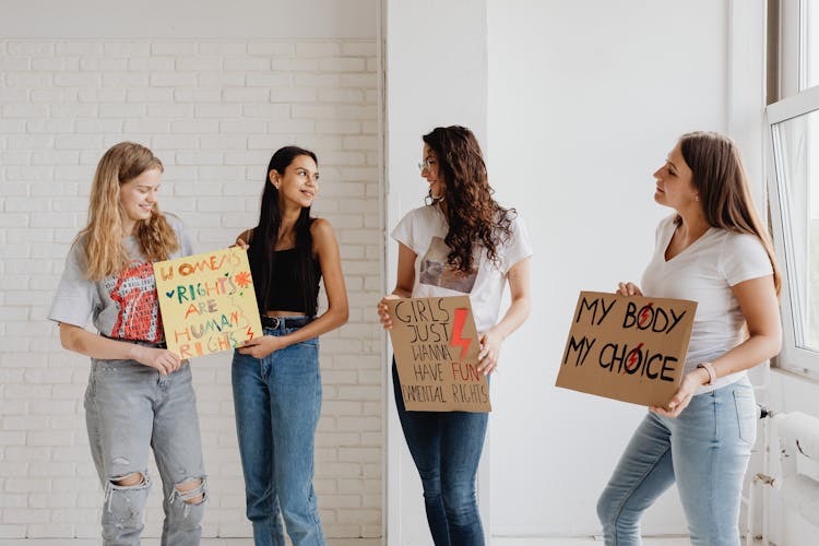 Women With Feminist Slogans