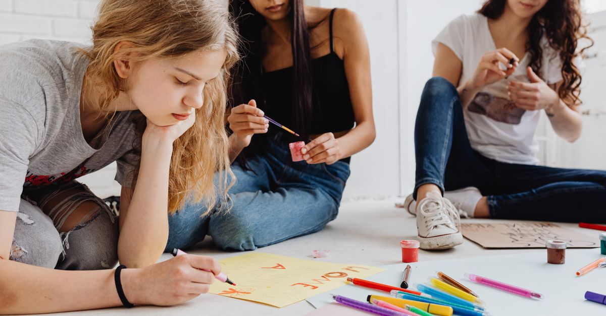 Woman Poster Making Women Making Protest Posters Indoors Β· Free Stock Photo