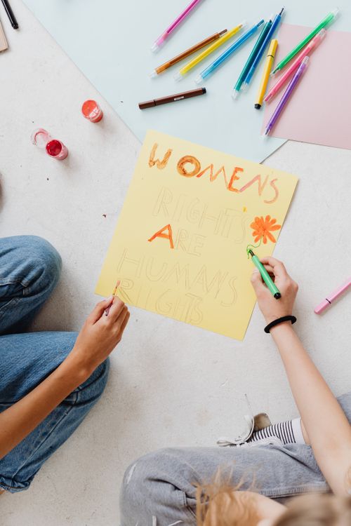 Women Rights Poster in the Making · Free Stock Photo