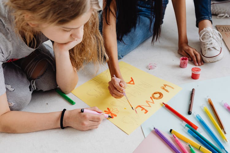 Girls Painting With Markers