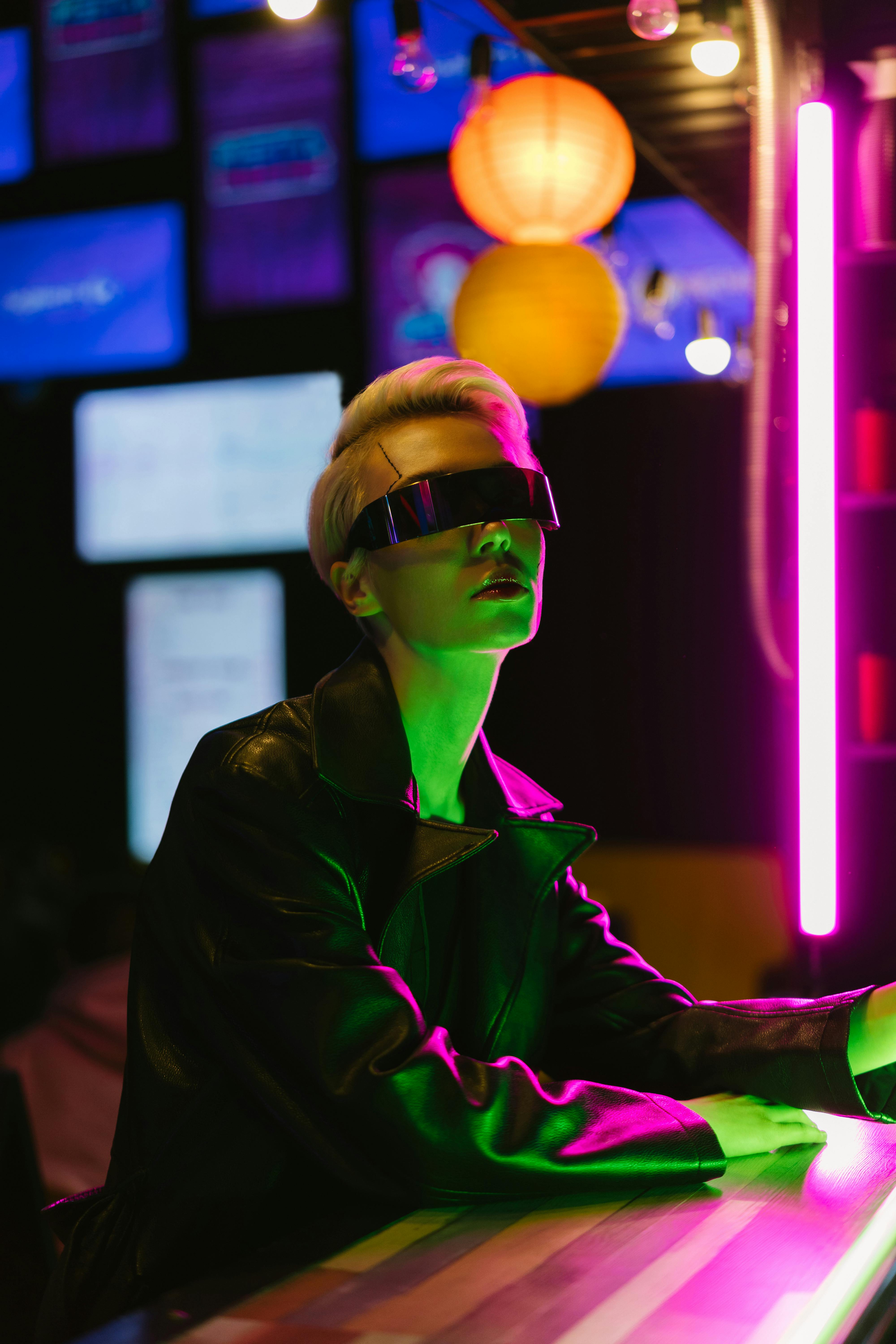 woman in black jacket wearing sunglasses