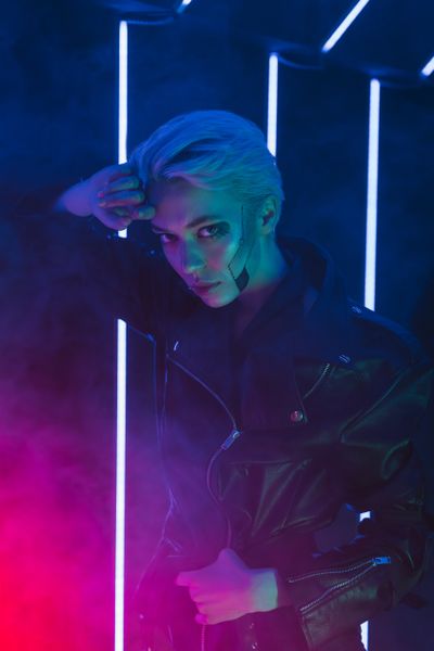 Portrait in neon light — Mikhail Nilov on Pexels